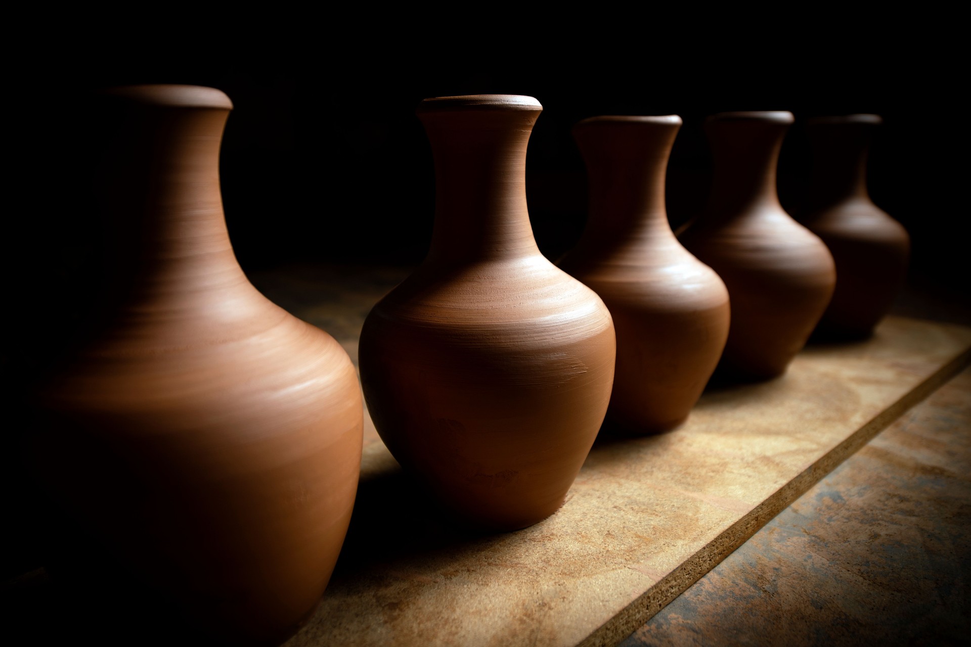 Five ceramic jugs